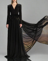 Long-sleeve gown with feather waist and flowing cape – Arnavo