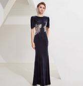 Velvet gown with sequin floral burst and padded shoulders – ASTRIA