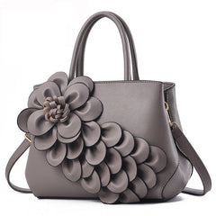 top-handle bag with 3D floral appliqué – AMARA