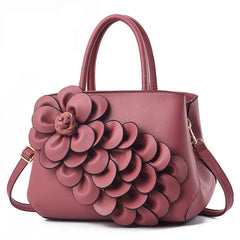top-handle bag with 3D floral appliqué – AMARA