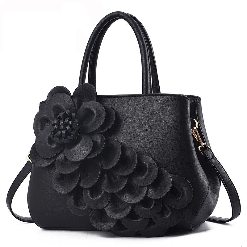 top-handle bag with 3D floral appliqué – AMARA