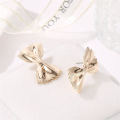 Bowtie-shaped metal stud earrings with glossy finish - Firasdy