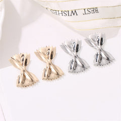 Bowtie-shaped metal stud earrings with glossy finish - Firasdy