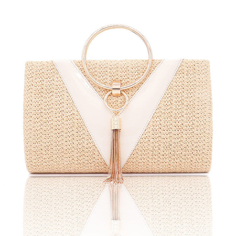 Woven handbag with gold ring handle and tassel detail - Bopi