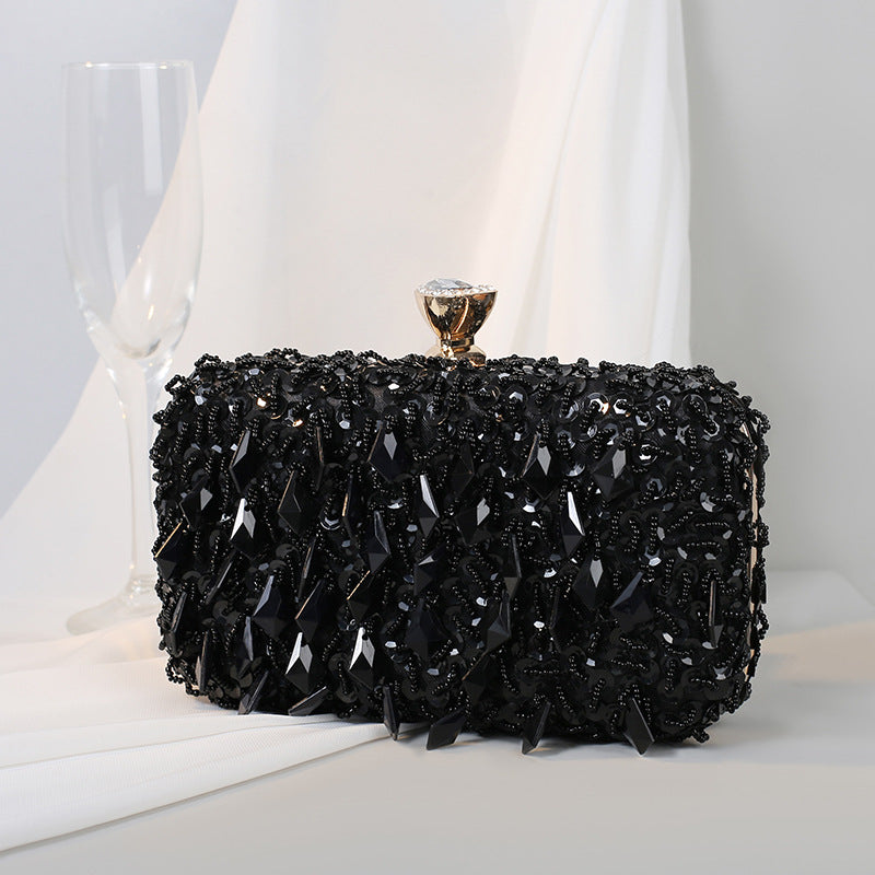 Pleated sequin clutch with diamond-shaped clasp - Puty