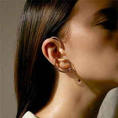 sculptural open-loop ear cuff with abstract teardrop tips – LYRIA