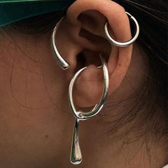 sculptural open-loop ear cuff with abstract teardrop tips – LYRIA