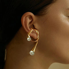 gold sculpted drop ear cuff with abstract loop design – VANTA