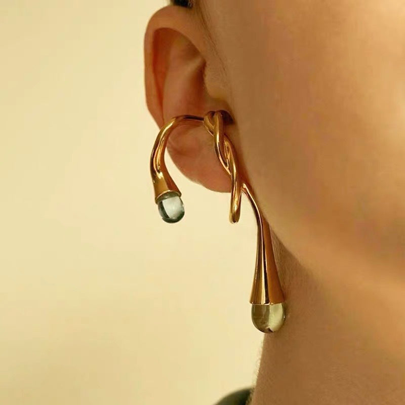 gold sculpted drop ear cuff with abstract loop design – VANTA