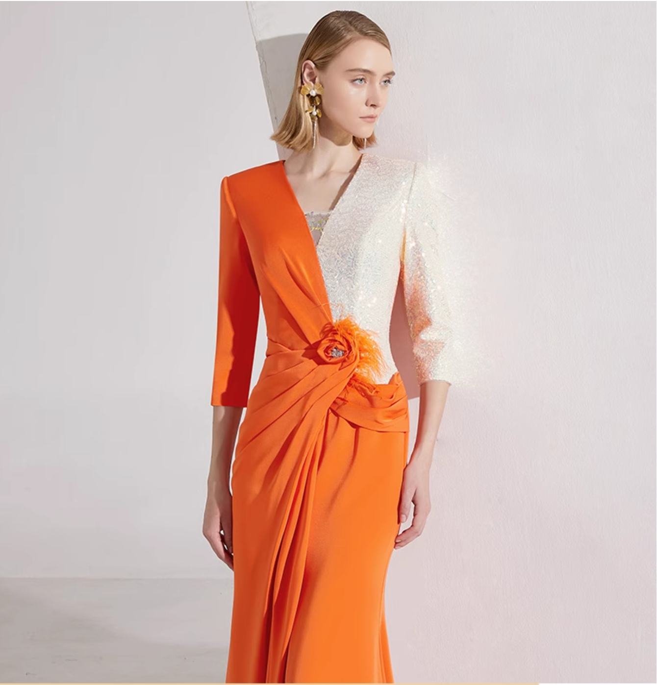 asymmetric gown with sequin sleeve and draped rose detail – SOLARA