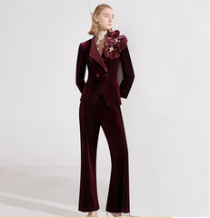 velvet flared pantsuit with oversized floral brooch – BORDEAUX