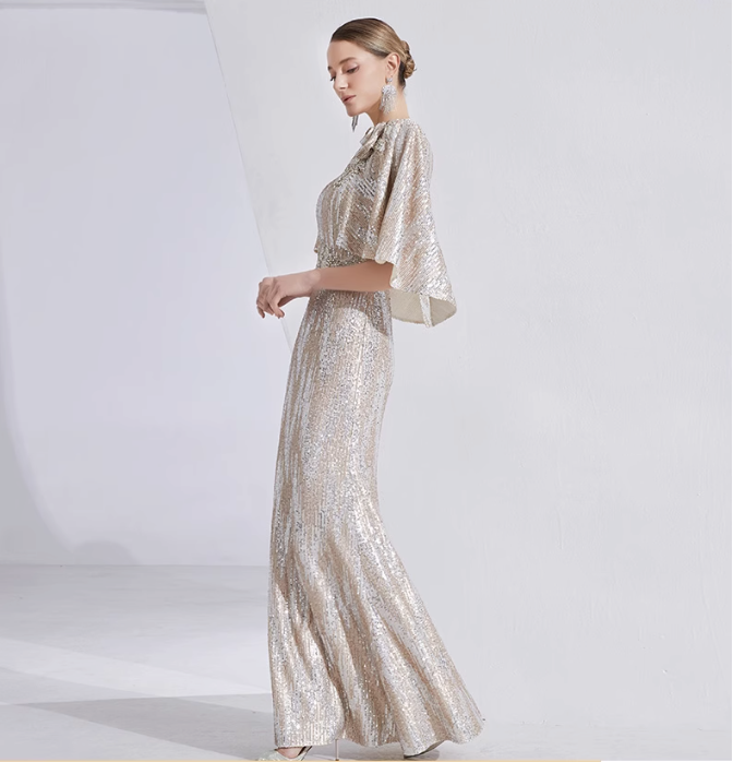 sequin mermaid gown with cape sleeves and floral brooch – LUMINA