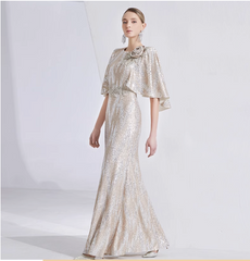 sequin mermaid gown with cape sleeves and floral brooch – LUMINA