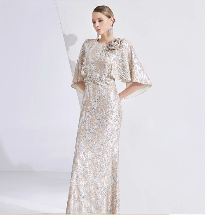 sequin mermaid gown with cape sleeves and floral brooch – LUMINA