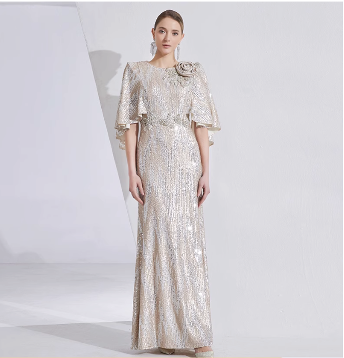sequin mermaid gown with cape sleeves and floral brooch – LUMINA