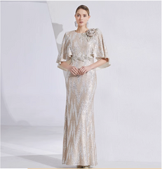 sequin mermaid gown with cape sleeves and floral brooch – LUMINA