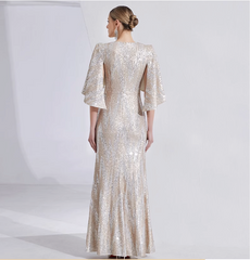 sequin mermaid gown with cape sleeves and floral brooch – LUMINA