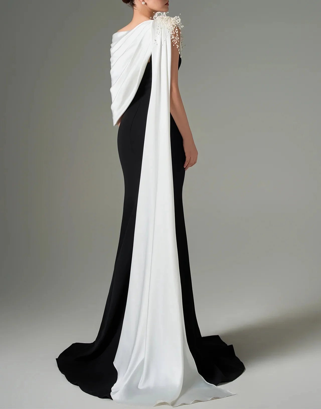 One-shoulder black gown with draped white cape – ZELEXE