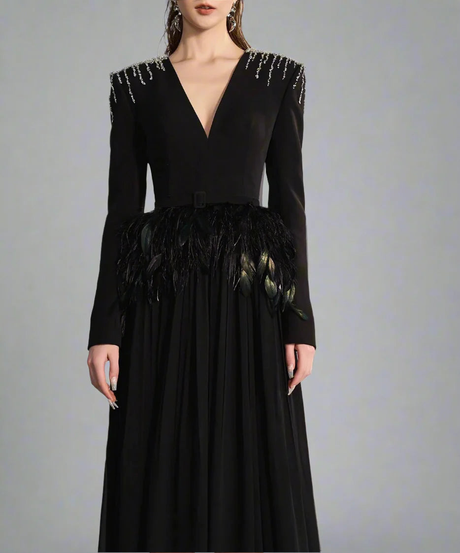 Long-sleeve gown with feather waist and flowing cape – Arnavo