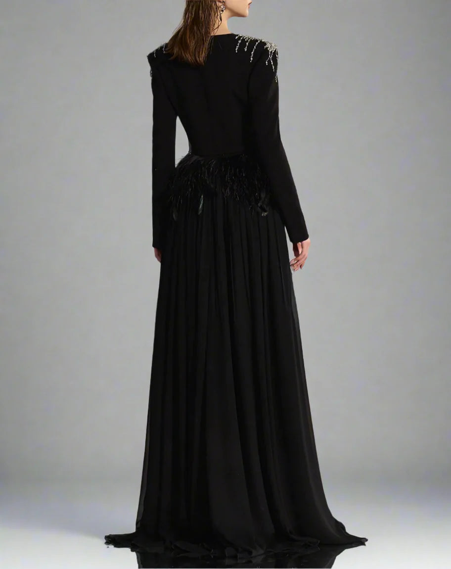 Long-sleeve gown with feather waist and flowing cape – Arnavo