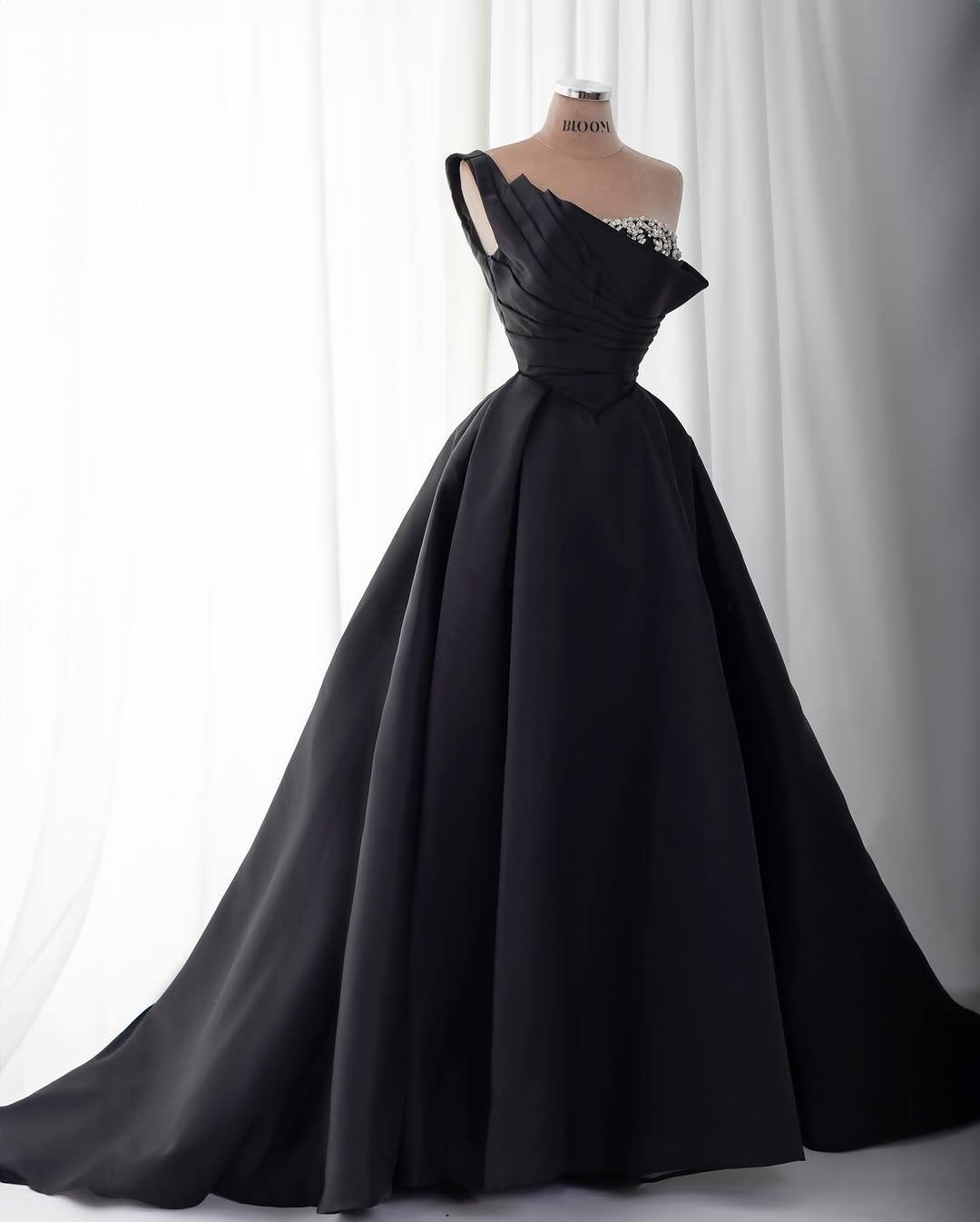 Off-shoulder ball gown with draped bodice and embellished sleeves – NOCTURNA