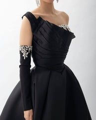 Off-shoulder ball gown with draped bodice and embellished sleeves – NOCTURNA