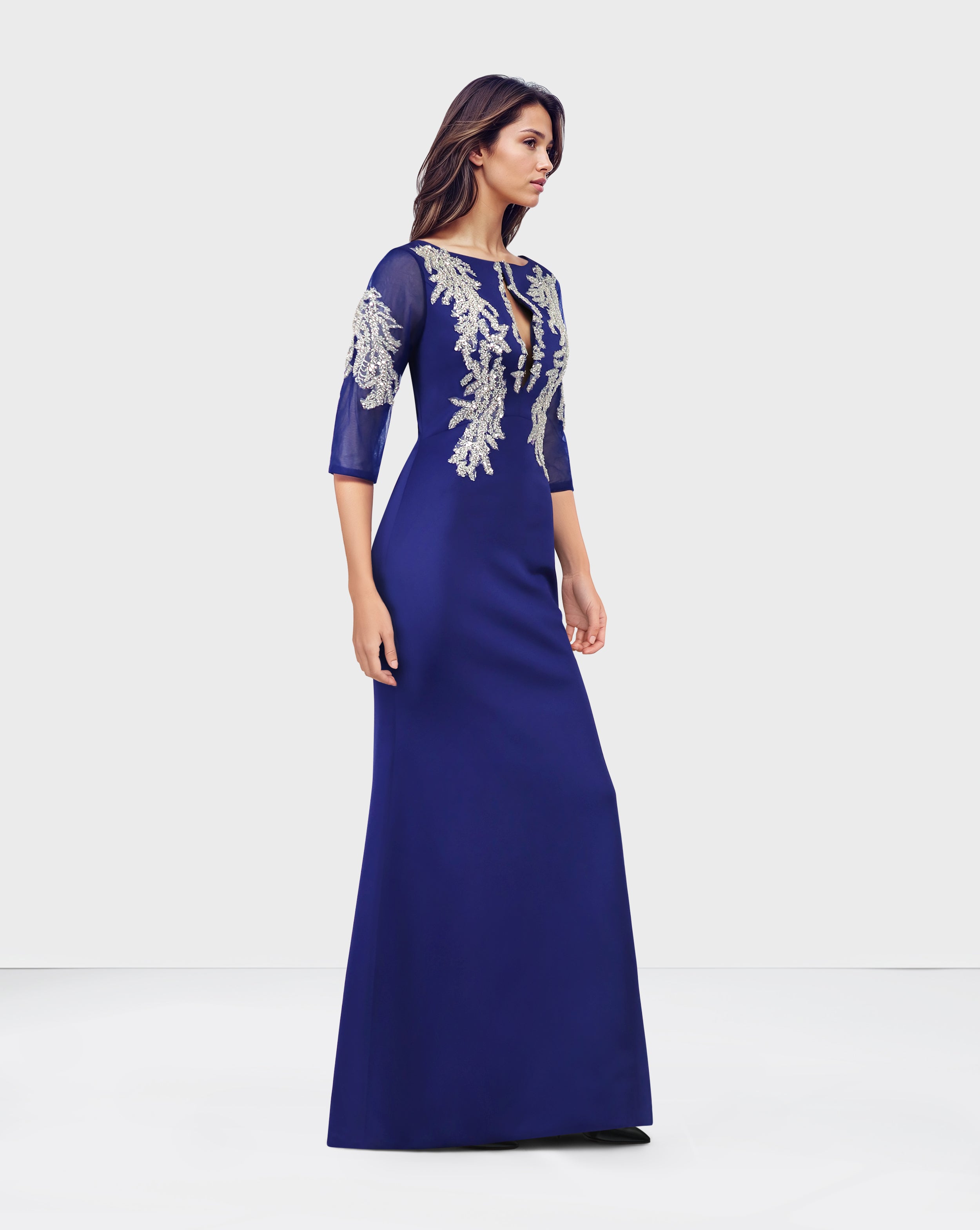 Sequined floor-length blue dress with see-through sleeves