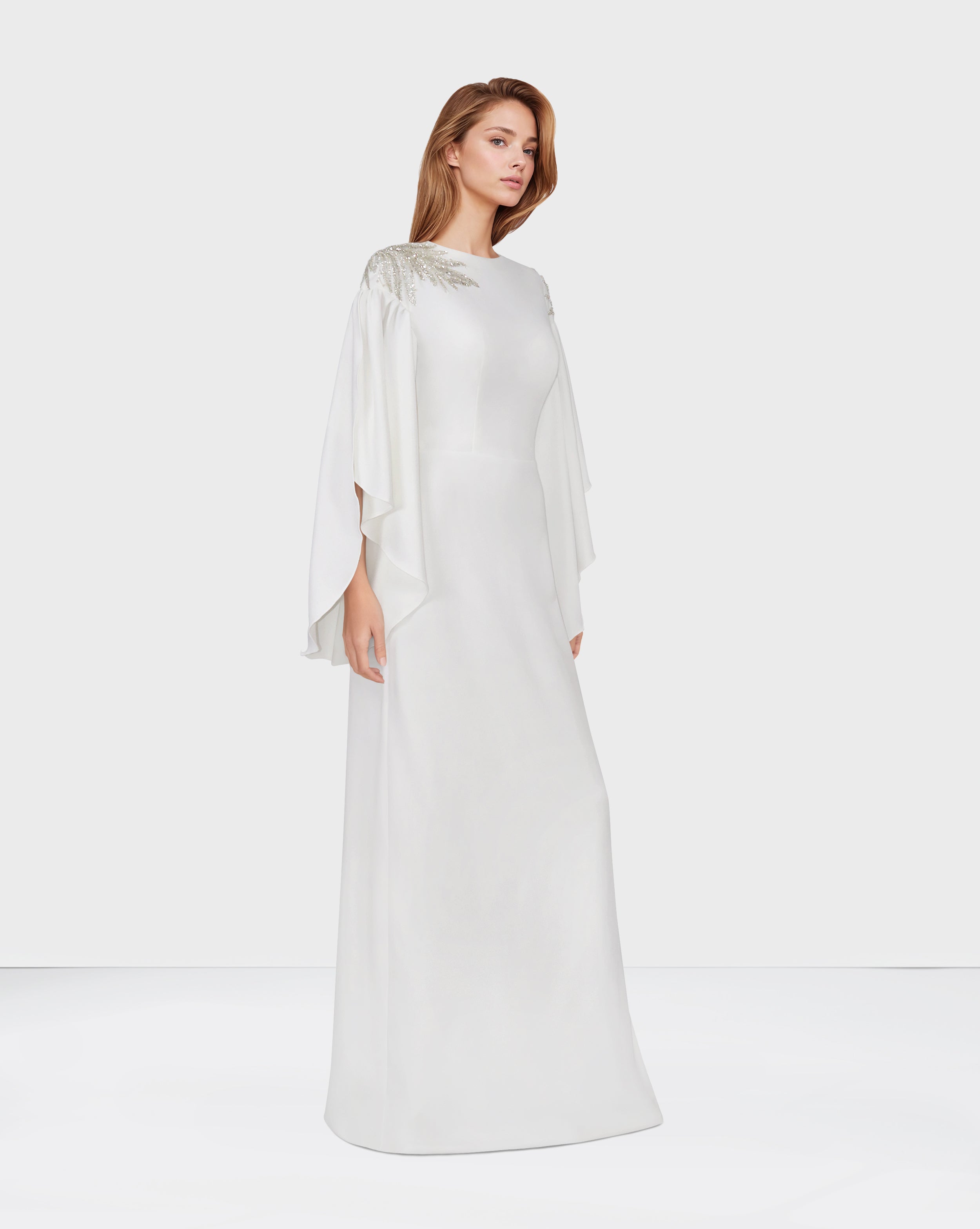 White column dress with ruffled sleeves and sequined shoulders