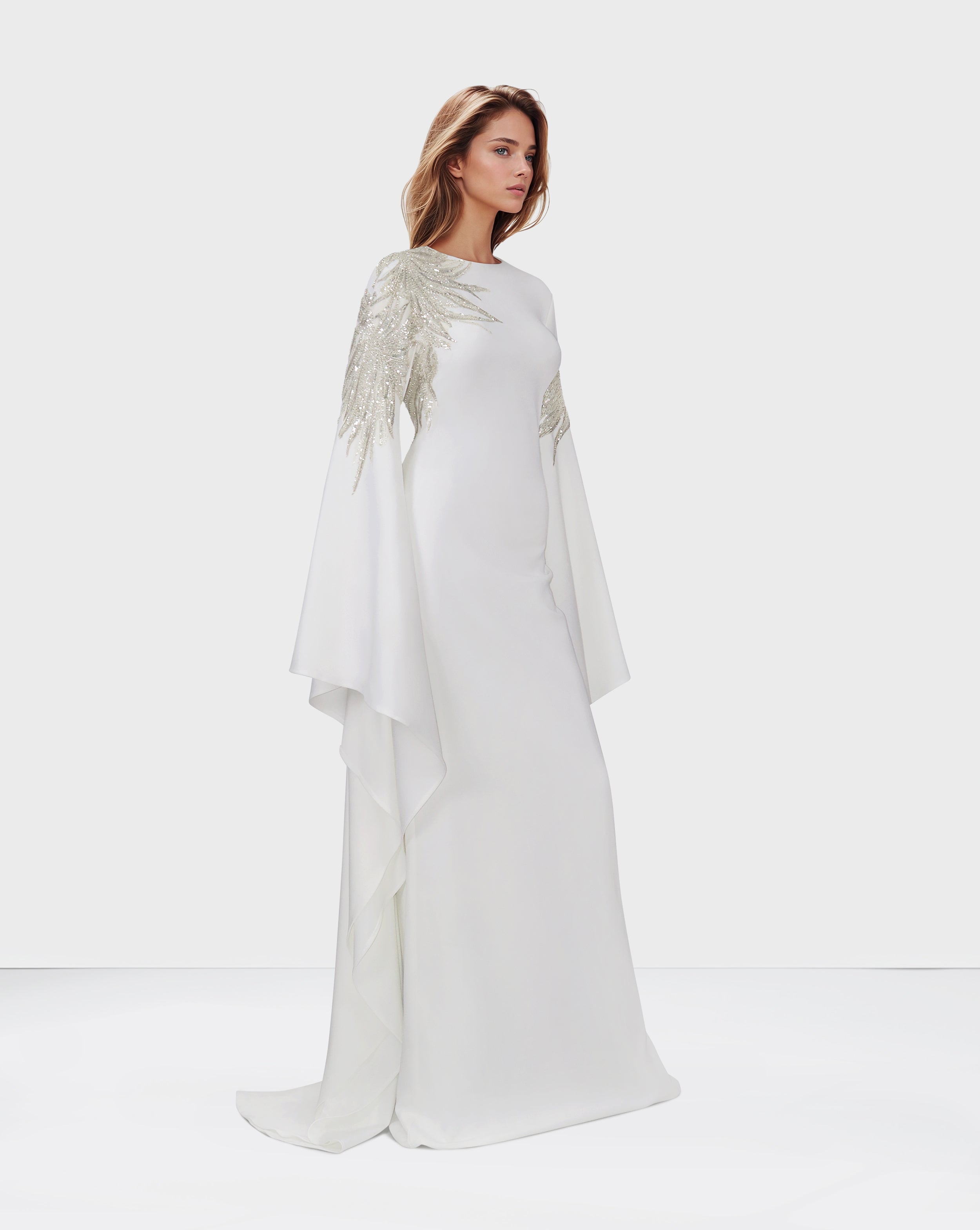 Sequined white dress with floor-length sleeves