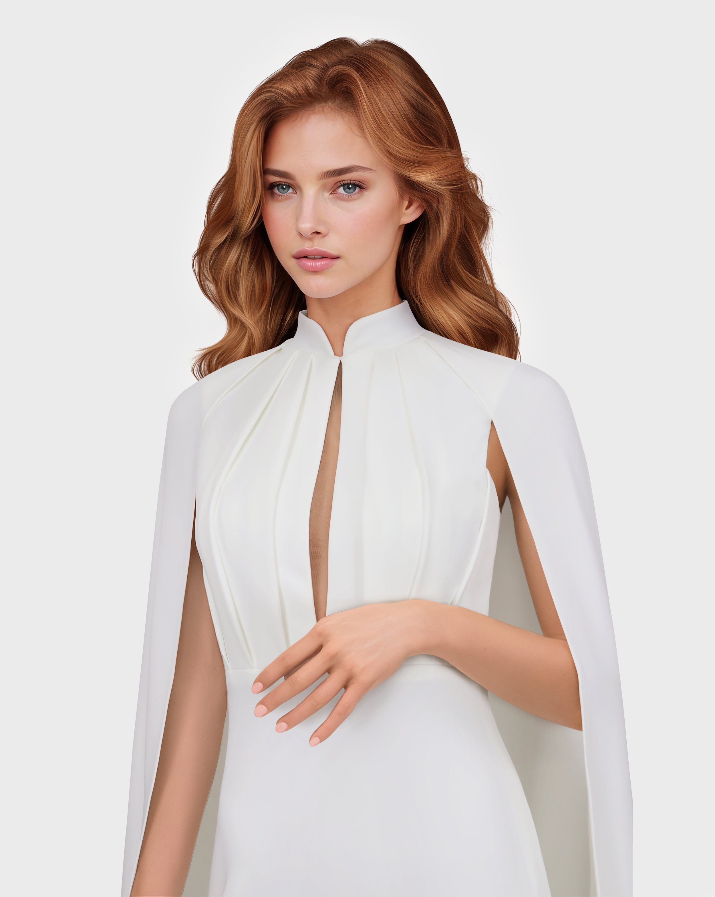 White pleated dress with neckline and cape