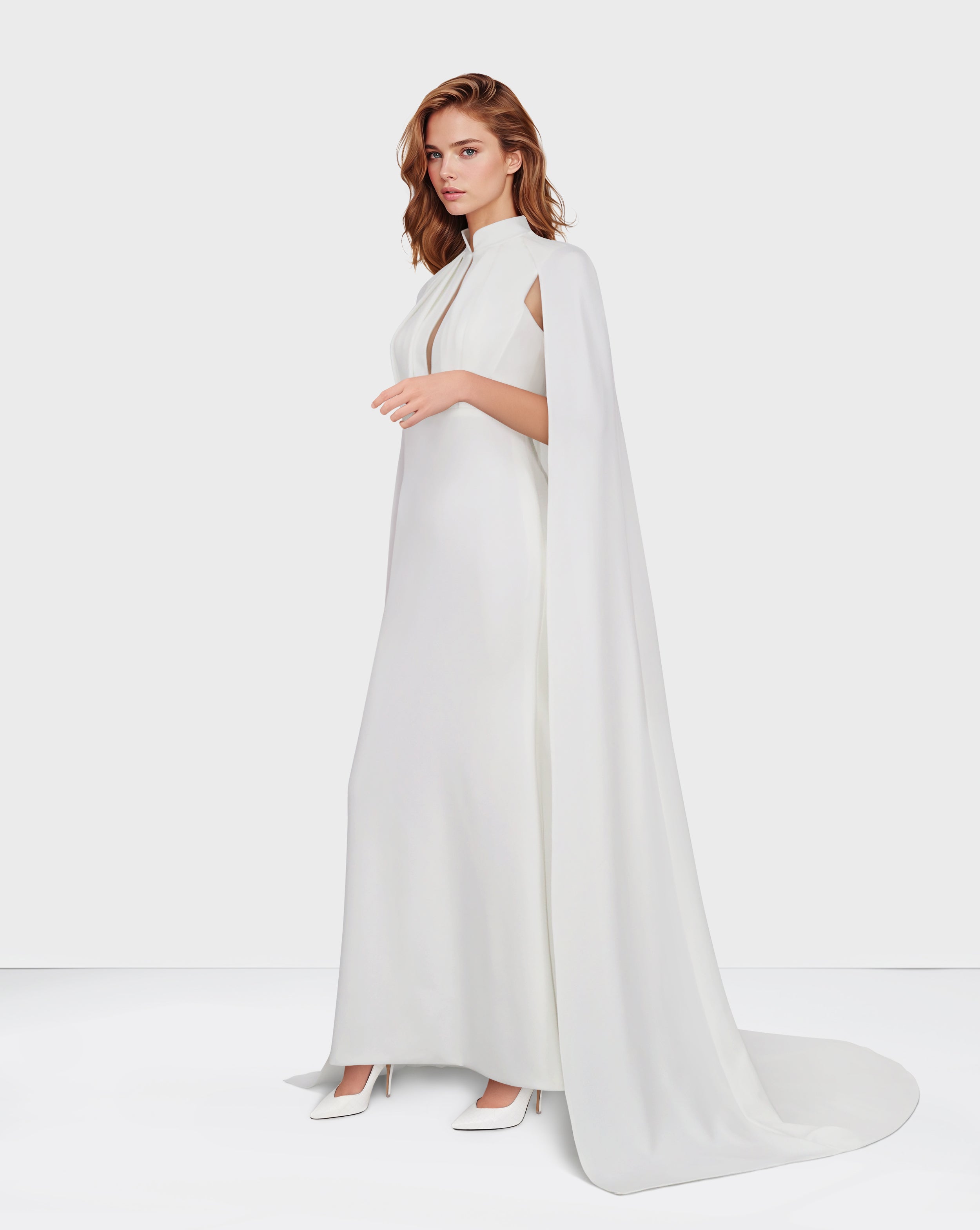 White pleated dress with neckline and cape