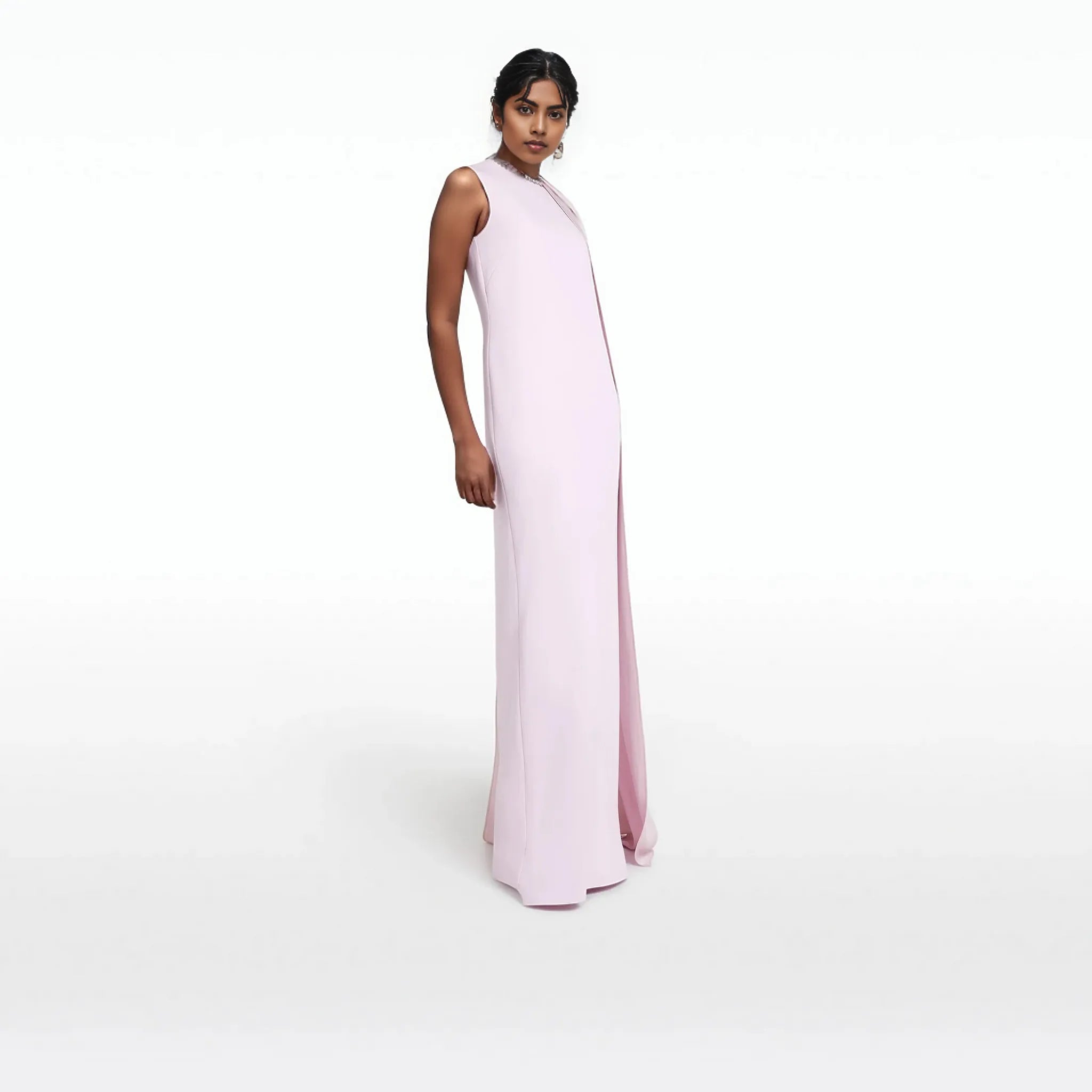 Sleeveless column gown with cascading side cape – Neiven