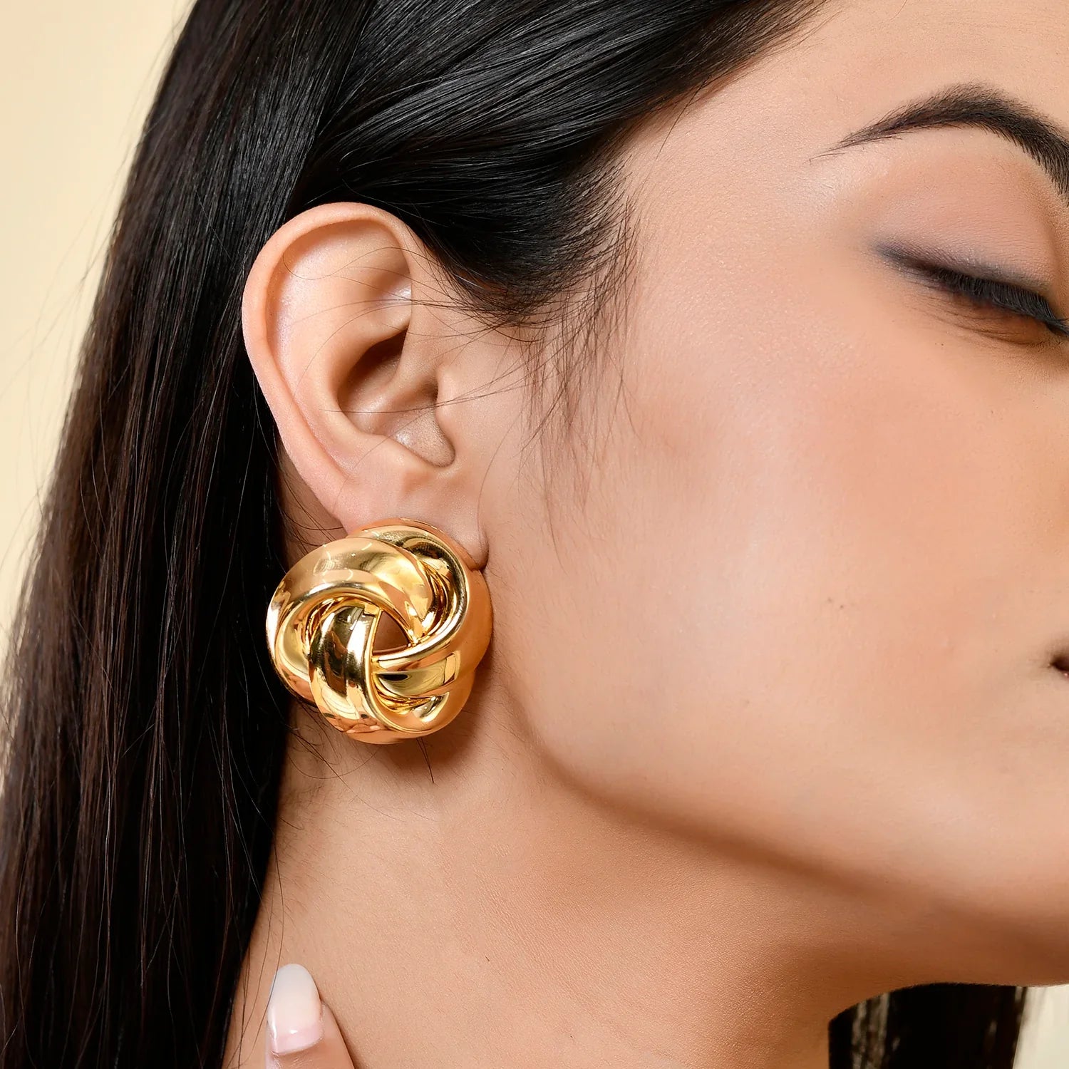 twisted dome stud earrings with polished finish – SELMAR