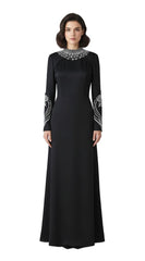 Black evening gown with silver embellishments on a white background
