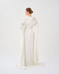 Sequined white dress with floor-length sleeves