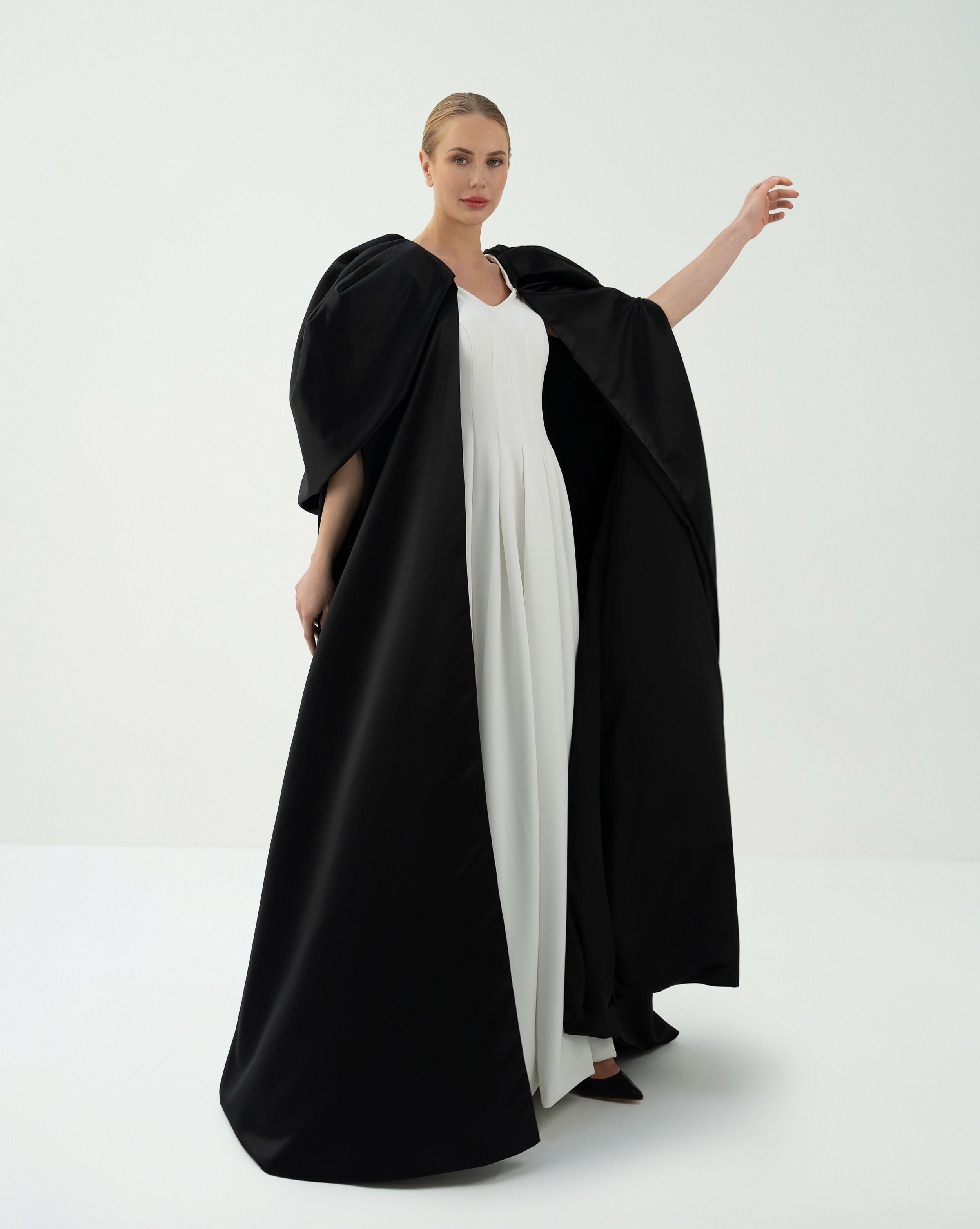 Sleeveless Pleated Gown with Dramatic Cape – Fatima