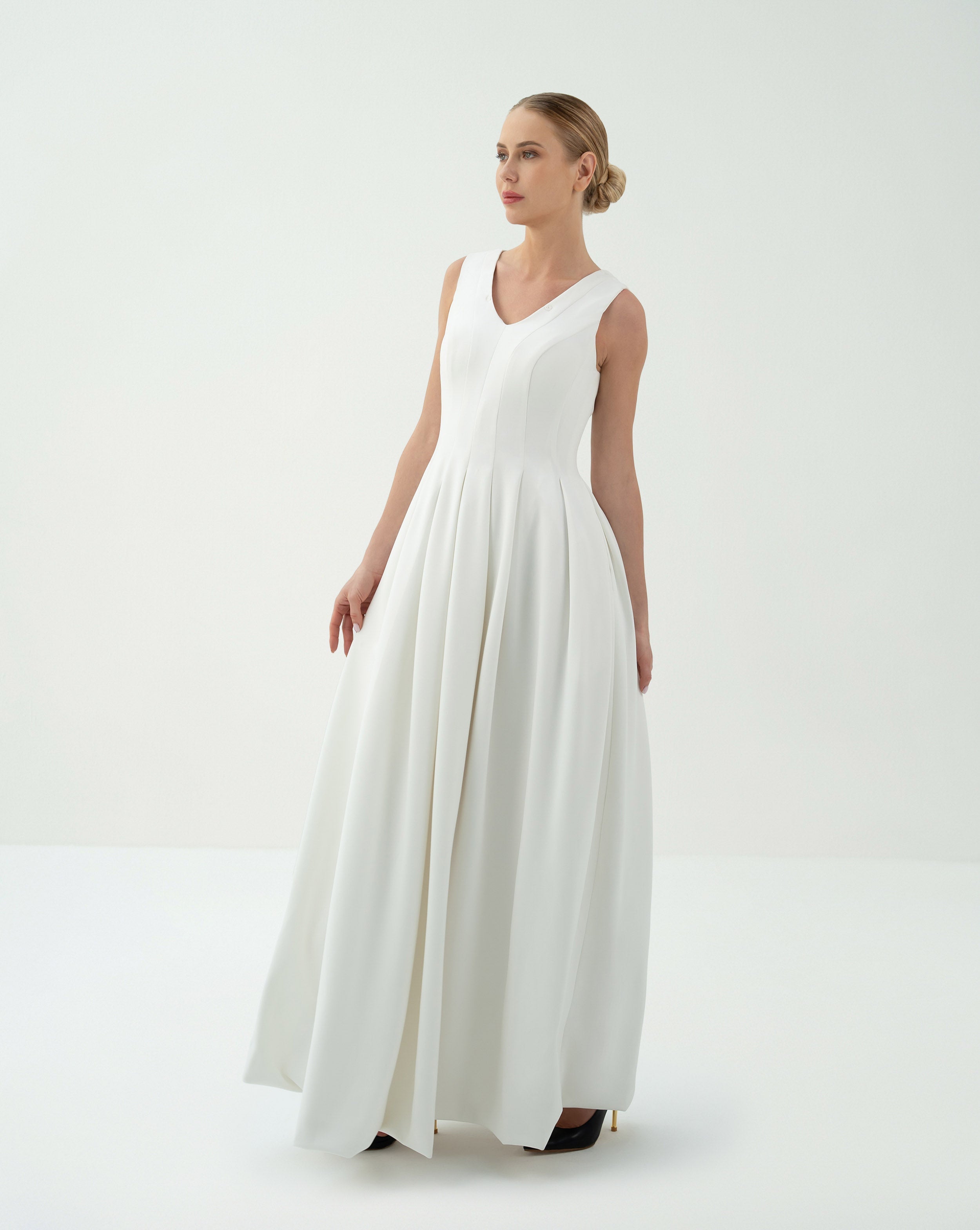 Sleeveless Pleated Gown with Dramatic Cape – Fatima
