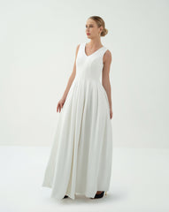 Sleeveless Pleated Gown with Dramatic Cape – Fatima