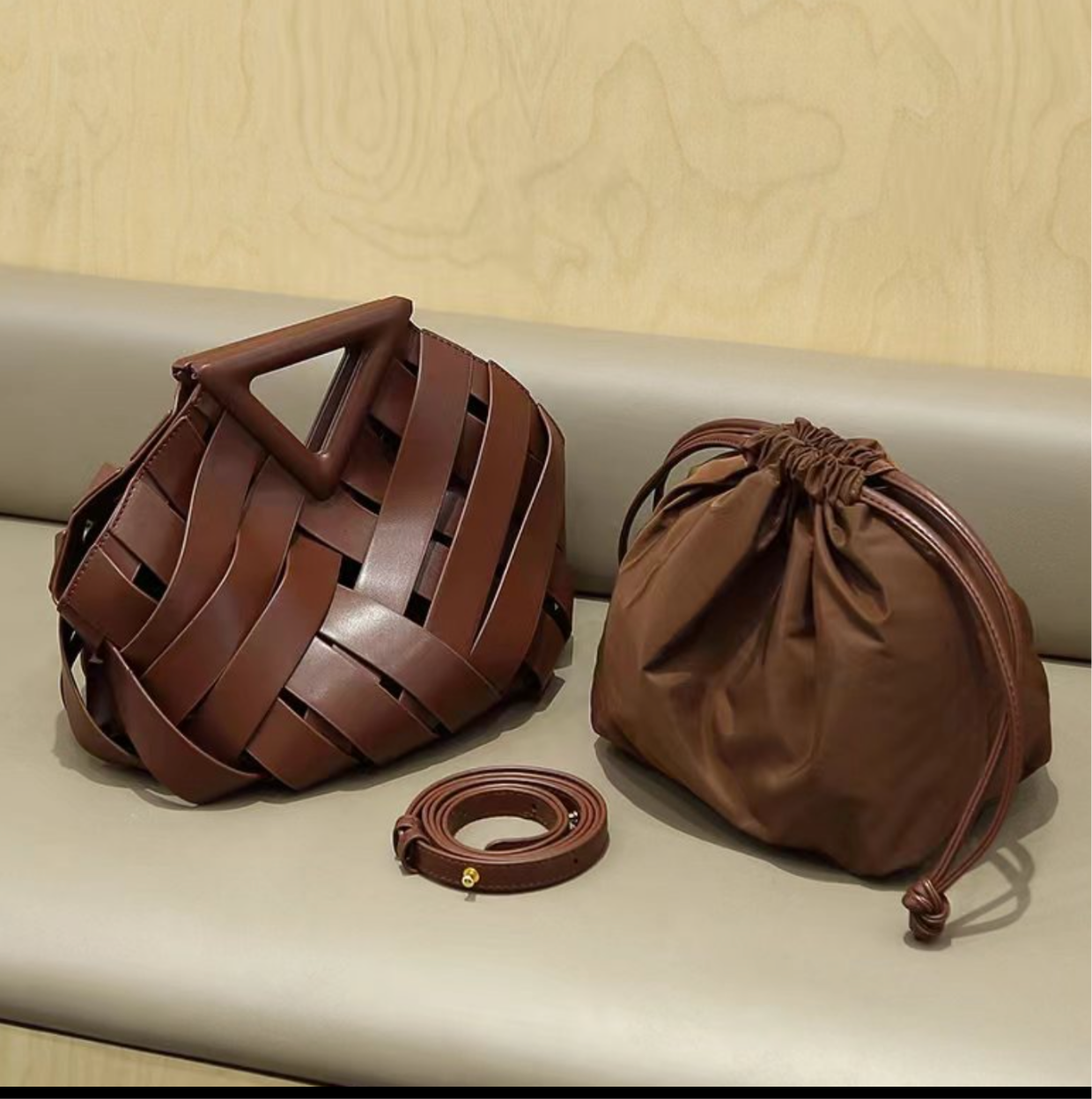 woven leather triangle-handle crossbody bag - Ahrana