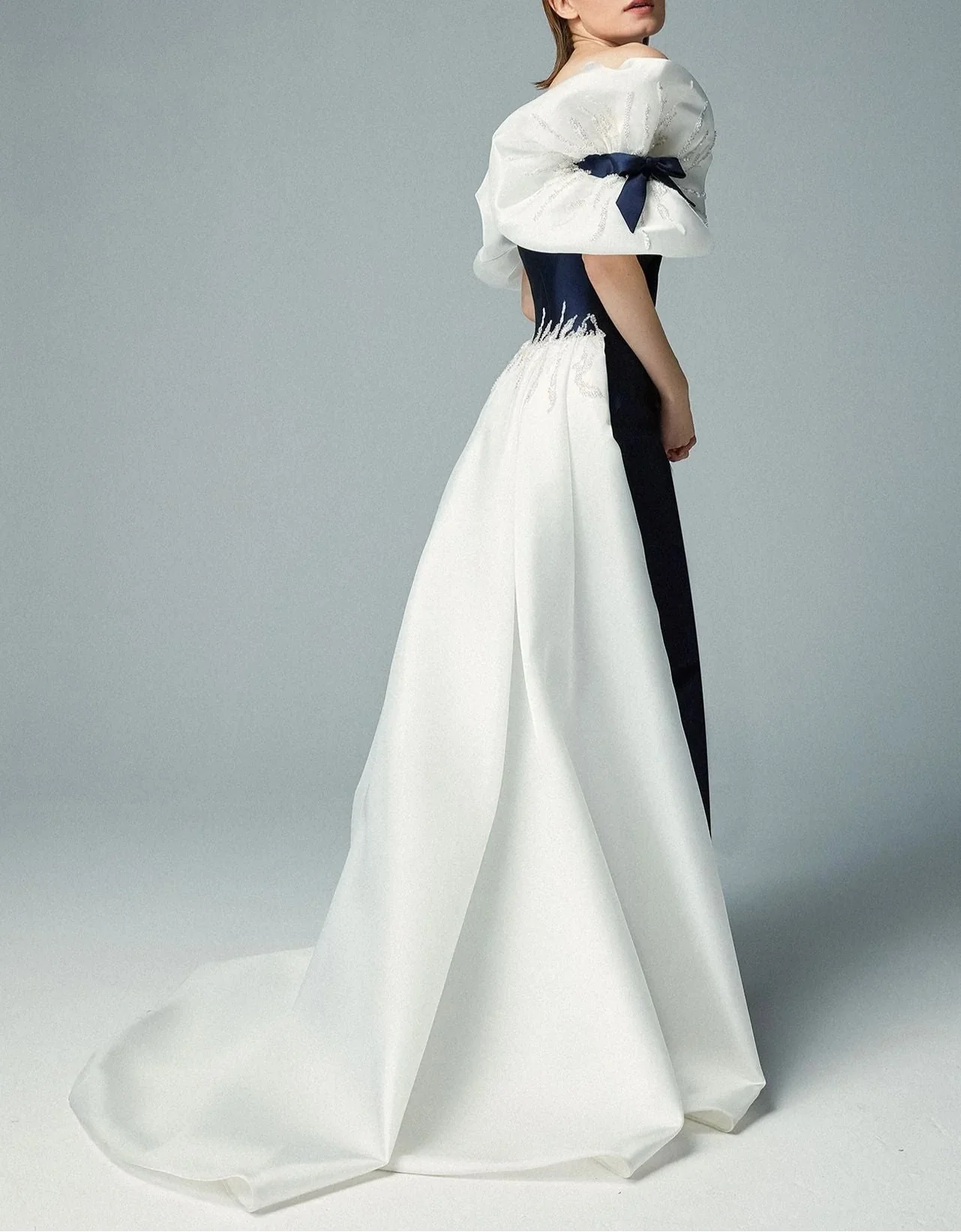 Strapless satin gown with voluminous sleeves and overskirt – AUROMA