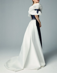 Strapless satin gown with voluminous sleeves and overskirt – AUROMA