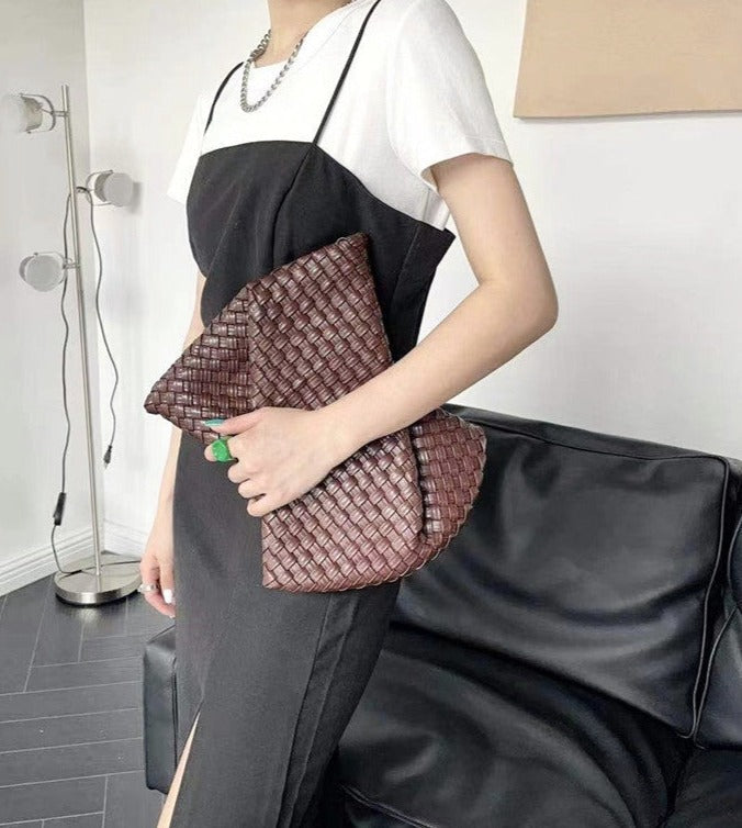 woven leather clutch with fringe detail – Aelueua