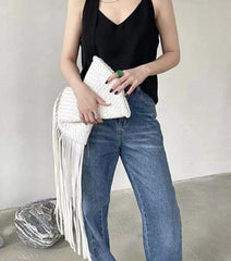 woven leather clutch with fringe detail – Aelueua