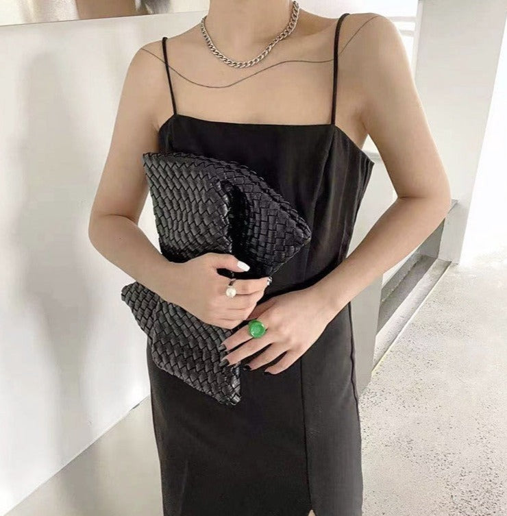 woven leather clutch with fringe detail – Aelueua