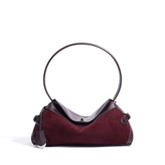 curved suede shoulder bag with flap closure – AURA