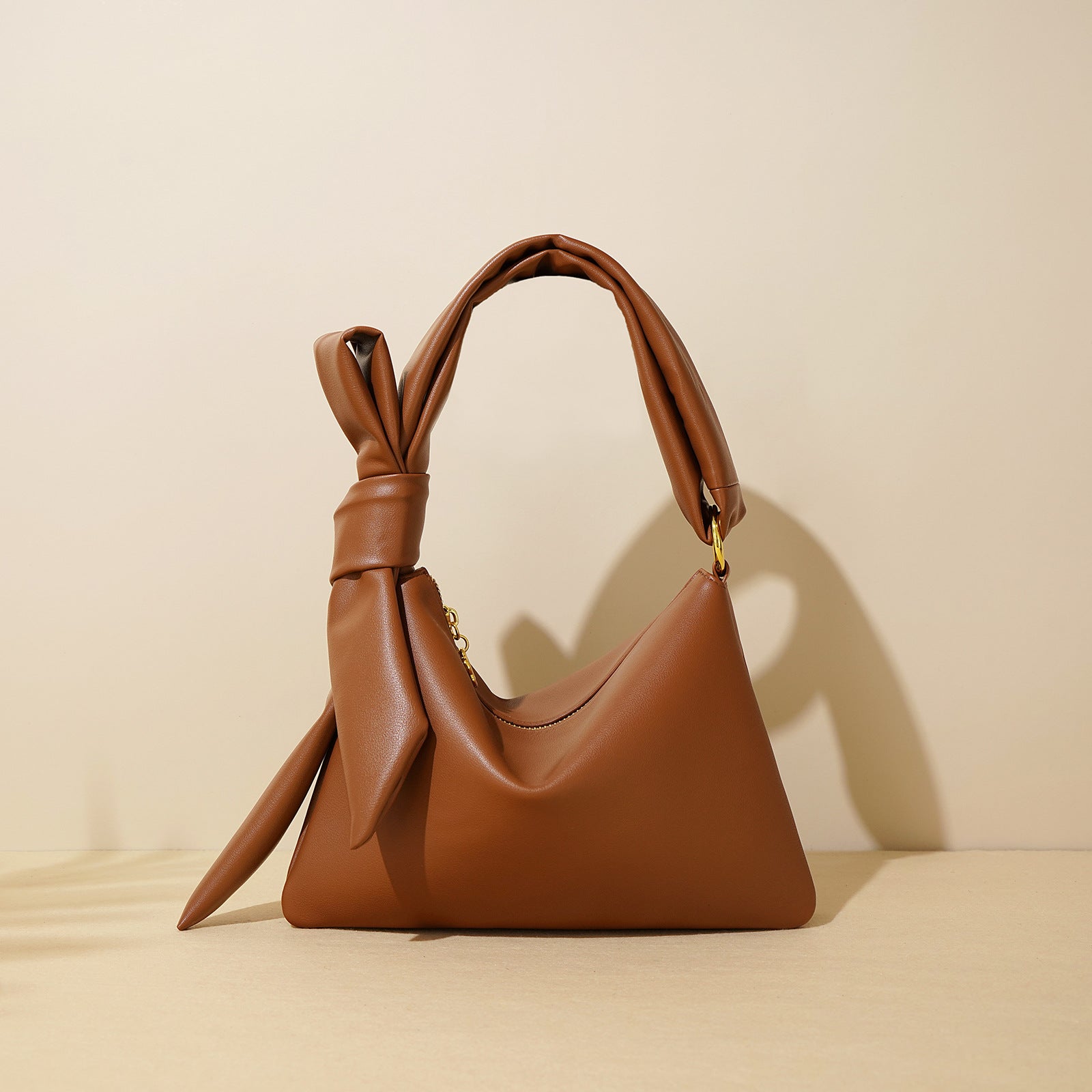 triangular shoulder bag with knotted handle detail – NAMRA