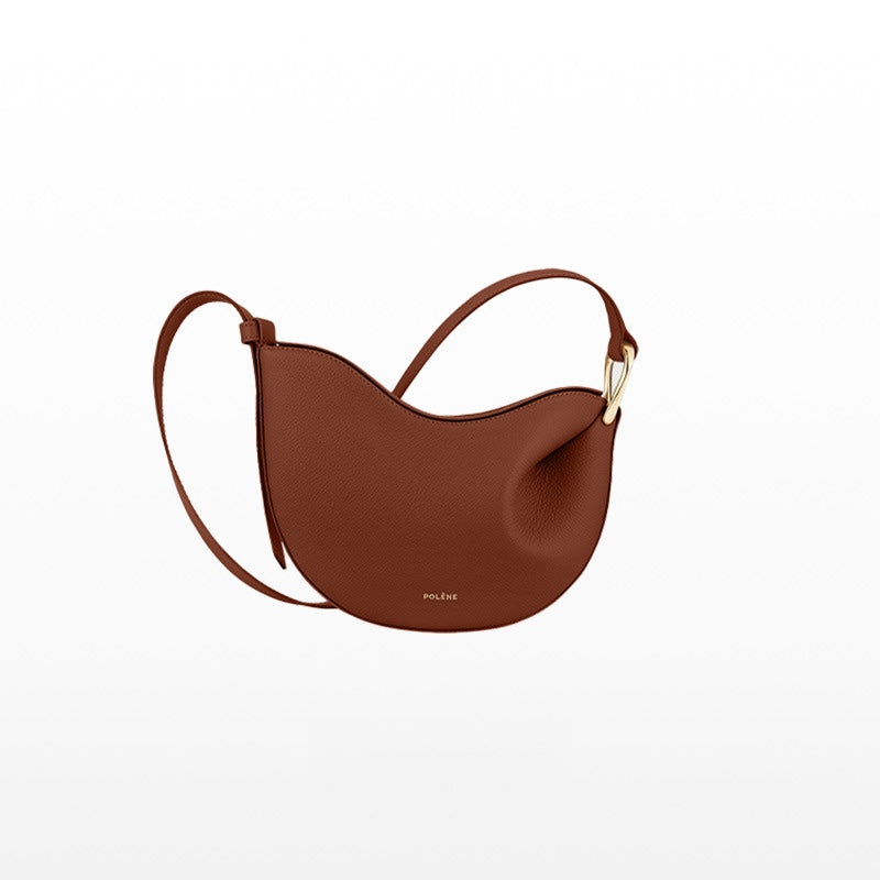symmetrical saddle crossbody with sculpted wave – ODE