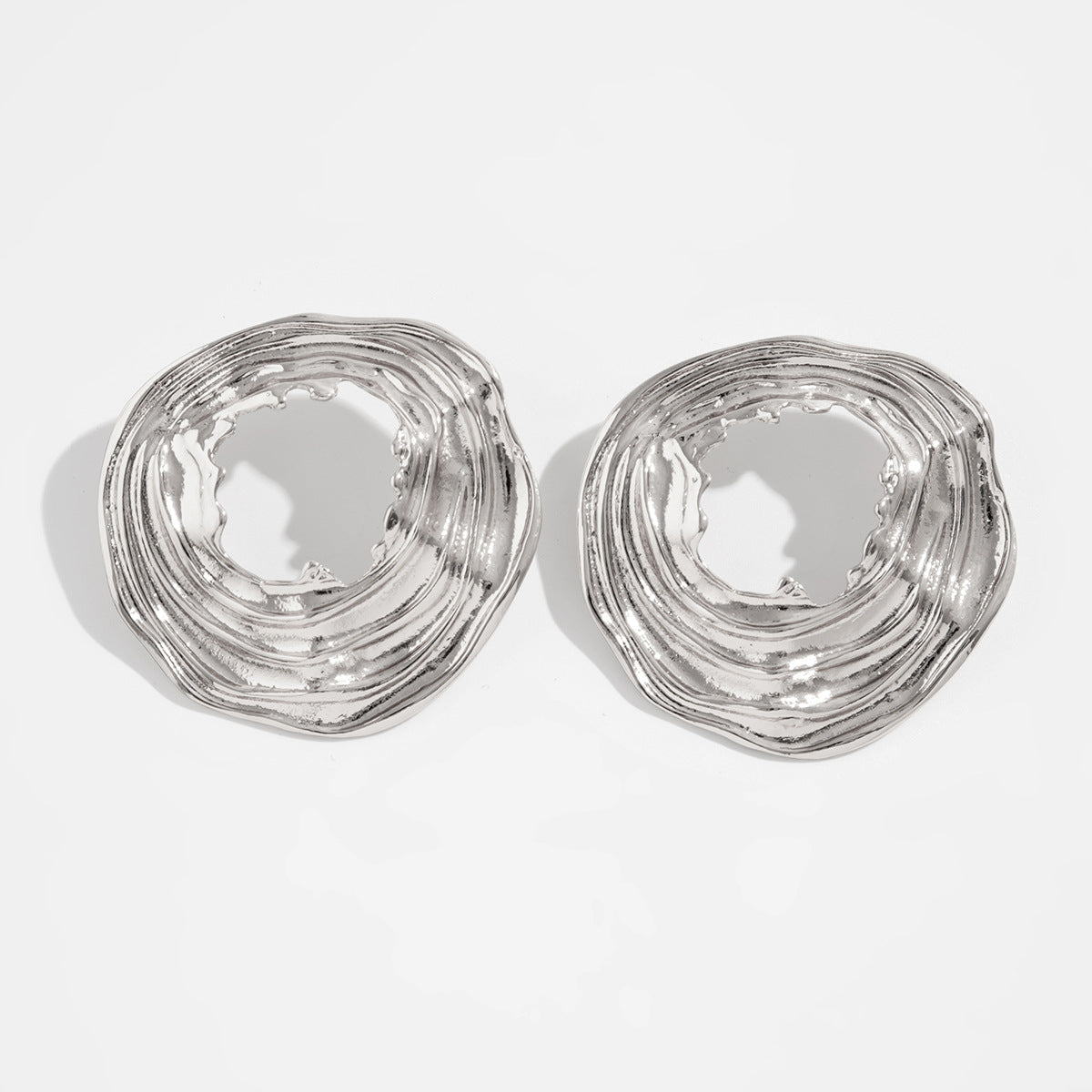 Textured open-circle earrings with sculptural ripples - Limali