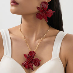 Lacquered floral necklace and earring set in sculpted red - Werti