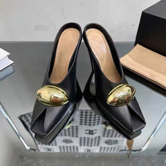 black leather mules with gold oval detail - LOMA